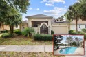 Discover the epitome of serene living in this LAKEFRONT POOL for sale in Palm Coast Florida Flagler County County on GolfHomes.com
