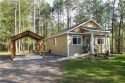 Not your average cottage! This 2023 built Timberland Cottage has for sale in Danbury Wisconsin Burnett County County on GolfHomes.com