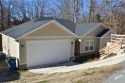 Needs paint, flooring and light deferred maintenance. Short sale for sale in Bella Vista Arkansas Benton County County on GolfHomes.com