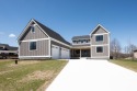 Welcome to 5812 Grande View Lane. If you're looking for a for sale in Jackson Michigan Jackson County County on GolfHomes.com