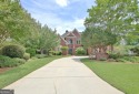 Stunning Golf Course Home on the 17th Tee!  This elegant 4-sides for sale in Newnan Georgia Coweta County County on GolfHomes.com