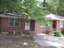 Discover this 4-sided brick DUPLEX in the charming Parkview for sale in Atlanta Georgia De Kalb County County on GolfHomes.com