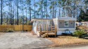 Affordable coastal living just minutes from the beach! This for sale in Murrells Inlet South Carolina Horry County County on GolfHomes.com