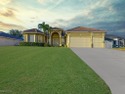 Experience Florida living at its finest in this stunning for sale in Cape Coral Florida Lee County County on GolfHomes.com