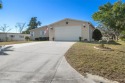 CAR ENTHUSIASTS AND GOLFERS DO NOT MISS THIS QUALITY HOME!!! for sale in Brooksville Florida Hernando County County on GolfHomes.com