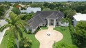 Magnificent contemporary estate home situated on a .6 acre for sale in Boca Raton Florida Palm Beach County County on GolfHomes.com