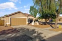 Sitting on a premium corner lot with ideal N/S exposure, this for sale in Queen Creek Arizona Maricopa County County on GolfHomes.com