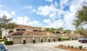 Enjoy a stunning golf course view from this second floor Abbey for sale in Fort Myers Florida Lee County County on GolfHomes.com