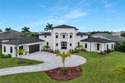 Gulf Access Lakefront Luxury Estate - New Construction 5 Bedroom for sale in Cape Coral Florida Charlotte County County on GolfHomes.com