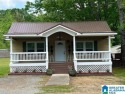 You will LOVE this nicely updated and character-filled home on a for sale in Pell City Alabama St. Clair County County on GolfHomes.com