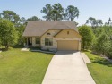 This immaculate custom home, consisting of 3 lots totaling for sale in Bastrop Texas Bastrop County County on GolfHomes.com