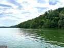 Acreage on the lake! Including 7 3/4 (+/-) acres, over 1100 feet for sale in Gainesville Georgia Hall County County on GolfHomes.com