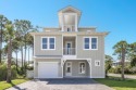 This stunning brand new home is located in the gated community for sale in Miramar Beach Florida Walton County County on GolfHomes.com