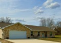 Welcome to this stunning 3 bedroom, 1.5 bath brick home situated for sale in Lake Isabella Michigan Isabella County County on GolfHomes.com