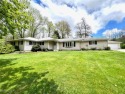 Enjoy One Floor Living in this Sprawling 4 Bedroom Ranch set on for sale in Chardon Ohio Geauga County County on GolfHomes.com