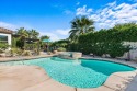 Enter through the beautiful decorative front door in this rarely for sale in Indio California Riverside County County on GolfHomes.com