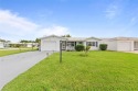 Discover this charming 2/2 home situated on a lovely corner lot for sale in Pompano Beach Florida Broward County County on GolfHomes.com