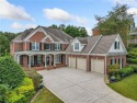 Luxury at its finest!  This gorgeous executive brick home for sale in Canton Georgia Cherokee County County on GolfHomes.com