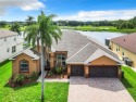 This spacious home has 4 bedrooms and 3 bathrooms. It boasts eye for sale in Davenport Florida Polk County County on GolfHomes.com