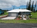 Peaceful ocean and fairway views from this 2022 build in the for sale in Naalehu Hawaii Big Island County County on GolfHomes.com