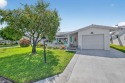 Spacious 2BR/2BA on Large Corner Lot in Leisureville! Bright and for sale in Boynton Beach Florida Palm Beach County County on GolfHomes.com