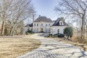 Located on a 1.27-acre sprawling lot on one of the most for sale in Alpharetta Georgia Fulton County County on GolfHomes.com