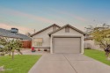 This quaint home invites natural light through the soaring for sale in Phoenix Arizona Maricopa County County on GolfHomes.com