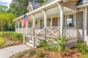 Welcome to 245 Watersedge Drive, a charming traditional home for sale in Pawleys Island South Carolina Georgetown County County on GolfHomes.com