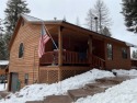 3 Bedroom, 2 Bathroom home on 2.66 acres in the highly desirable for sale in Seeley Lake Montana Missoula County County on GolfHomes.com