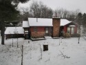 Opportunity awaits in this ranch home situated in Canadian Lakes, Michigan