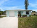 Welcome to this beautifully maintained CBS home located in a for sale in Port Saint Lucie Florida Saint Lucie County County on GolfHomes.com