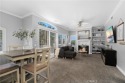 Welcome to this charming 2-bedroom, 2-bathroom end-unit condo for sale in Rancho Santa Margarita California Orange County County on GolfHomes.com