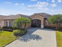 Beautiful and immaculately maintained Savoy model featuring a for sale in Kissimmee Florida Osceola County County on GolfHomes.com