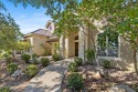 Perched on a hill in the prestigious golf community of Comanche for sale in Kerrville Texas Kerr County County on GolfHomes.com