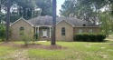 Beautiful 3-bedroom, 2-bath home situated on 1 acre overlooking for sale in Purvis Mississippi Lamar County County on GolfHomes.com