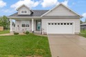 Step into this beautiful ranch-style home nestled on a spacious for sale in Woodward Iowa Dallas County County on GolfHomes.com