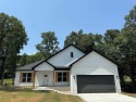 New construction home on the golf course! Enjoy this modern 4 for sale in Hot Springs Arkansas Garland County County on GolfHomes.com