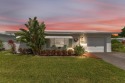 Peace of mind comes built- in with this beautifully maintained for sale in Pompano Beach Florida Broward County County on GolfHomes.com