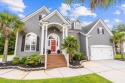 Welcome to 5021 Robeson Place, a beautifully upgraded 4-bedroom for sale in Summerville South Carolina Dorchester County County on GolfHomes.com