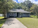 Discover your coastal haven in the tranquil Kings Grant for sale in Murrells Inlet South Carolina Horry County County on GolfHomes.com