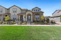 This beautifully crafted, Italian-inspired end unit luxury for sale in Windsor Colorado Larimer County County on GolfHomes.com