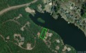 Waterfront Lot on Lake Pineda.  Utilities on the property for sale in Hot Springs Village Arkansas Garland County County on GolfHomes.com