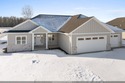 Step into brand new construction in Wrightstown where thoughtful for sale in Wrightstown Wisconsin Outagamie County County on GolfHomes.com