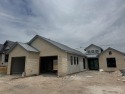 NEW CONSTRUCTION BY HILL COUNTRY SIGNATURE HOMES sits on garden for sale in Kerrville Texas Kerr County County on GolfHomes.com
