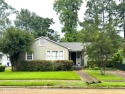 NEW TO THE MARKET IS THIS 3 BEDROOM, 2 BATH HOME JUST ONE BLOCK for sale in Natchez Mississippi Adams County County on GolfHomes.com