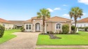 Beautiful Mediterranean Style Ranch Home with Pond Views for for sale in Little River South Carolina Horry County County on GolfHomes.com