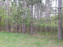 Beautifully wooded lot.  Backs up to the Lakes Golf CourseEnjoy for sale in Gaylord Michigan Otsego County County on GolfHomes.com