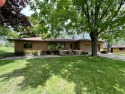Impeccably maintained mid-century gem, on the market for the for sale in New Berlin Wisconsin Waukesha County County on GolfHomes.com