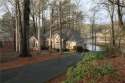 BEAUTIFUL BRICK RANCH ON 1.6+ ACRES with STRIKING VIEWS OF LAKE for sale in Kennesaw Georgia Cobb County County on GolfHomes.com