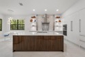Live the ultimate country club lifestyle in this exquisitely for sale in Pompano Beach Florida Broward County County on GolfHomes.com